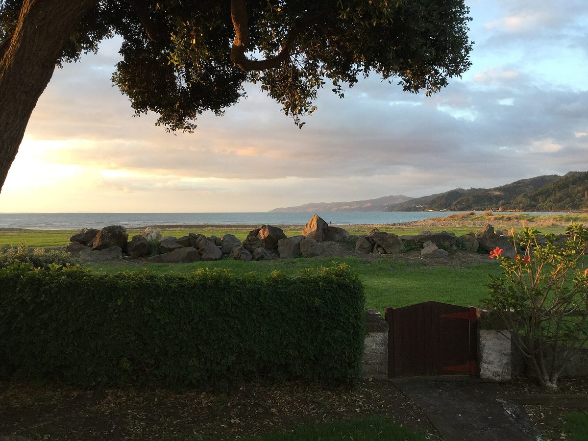 The beach and headland at Te Puru on the coast road north of Thames