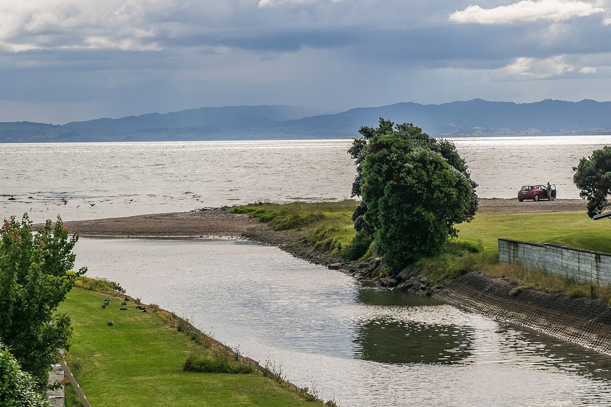 Tararu Creek flowing into the Firth of Thames at Tararu, Thames
